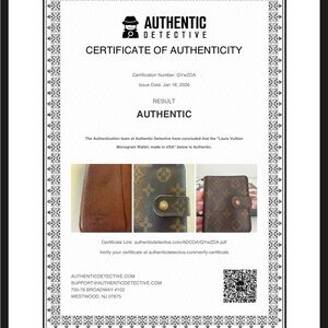 Authentic Louis Vuitton Monogram Brown Wallet.